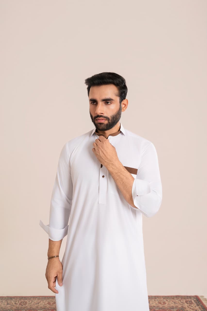 Ivory White, Wash and Wear fabric Stitched Men’s Shalwar Kameez. Collection”.